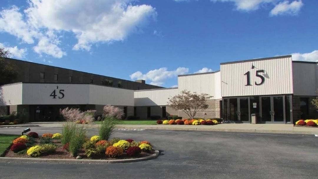 The front of a building with the number 15 on it.