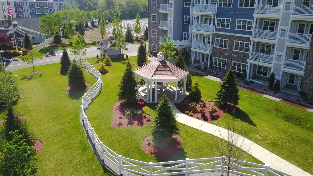 An aerial view of an apartment complex with a gazebo.