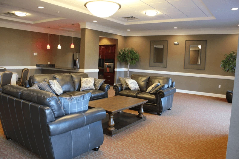 A living room with couches and a coffee table.