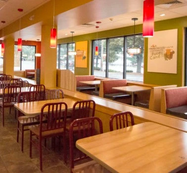 The interior of a fast food restaurant.