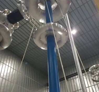 A group of blue and white wires in a metal building.