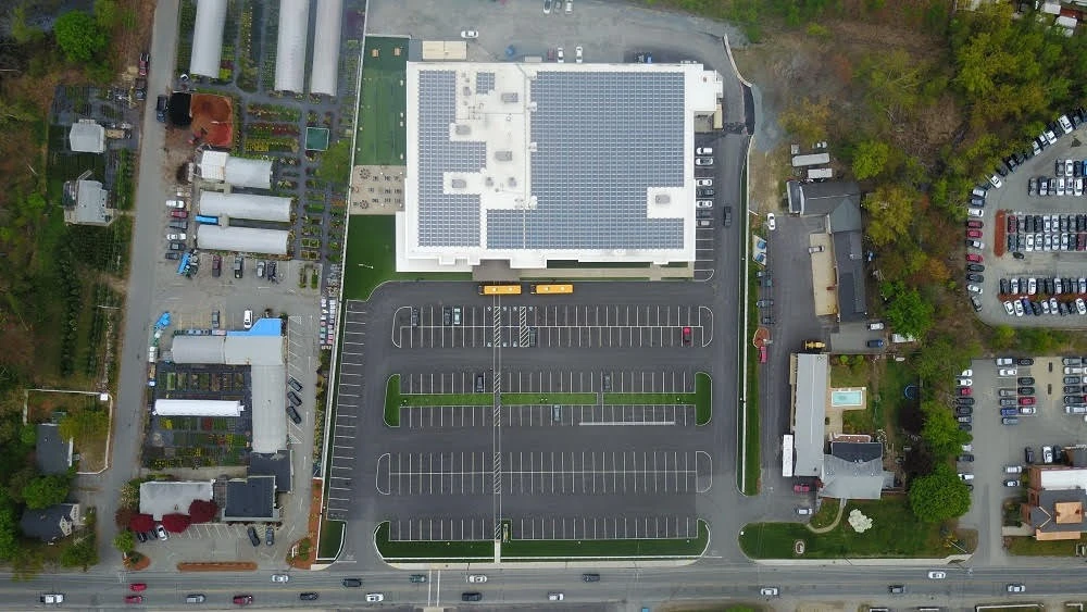 An aerial view of a school parking lot.