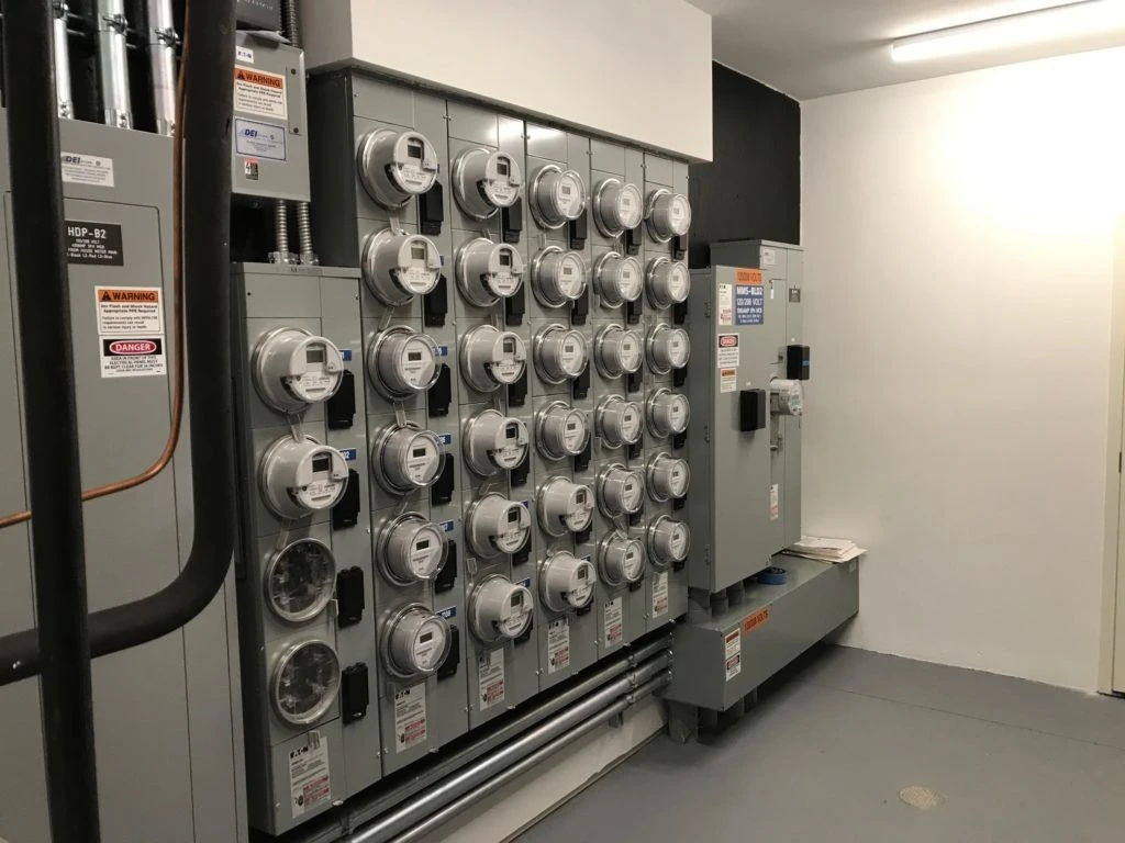 A large electrical panel in a room.