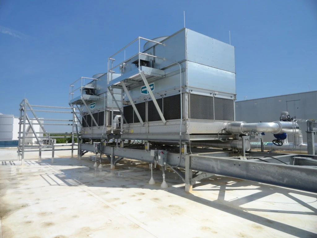 A large air conditioning unit on the roof of a building.
