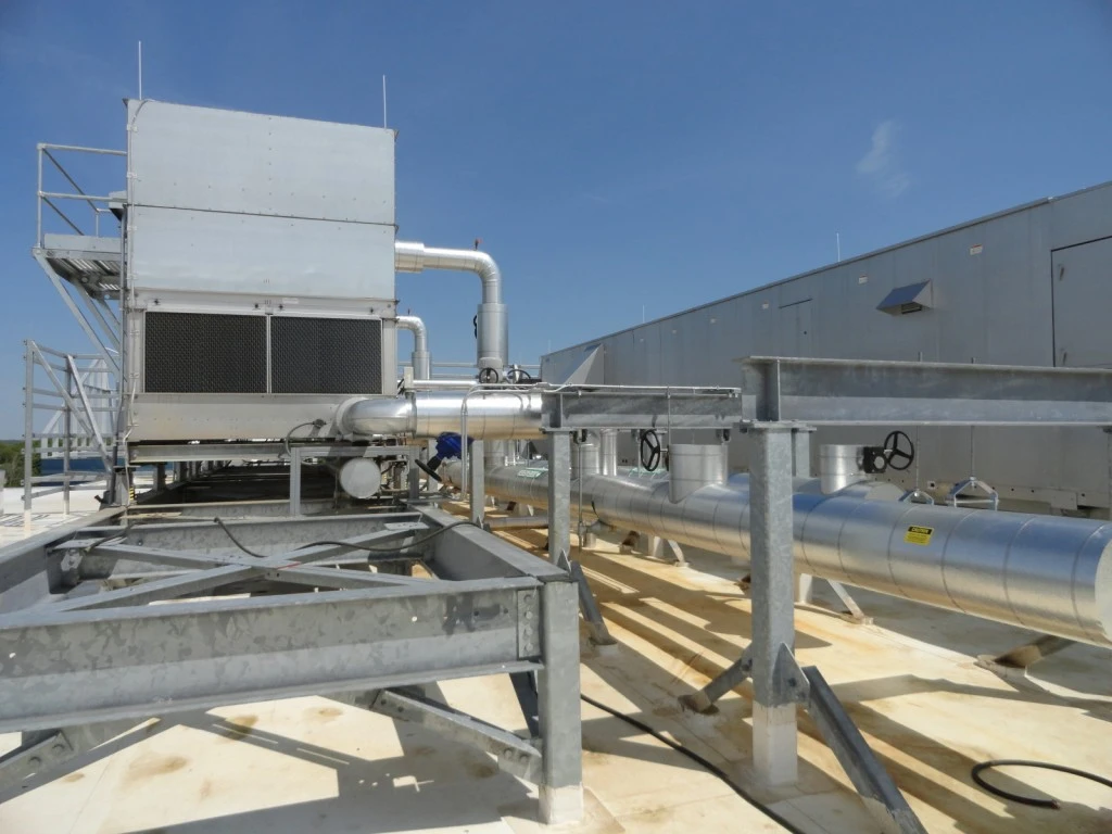 A large air conditioning unit on a roof.