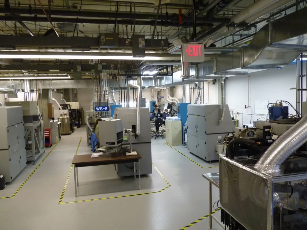 A large laboratory with many machines and equipment.
