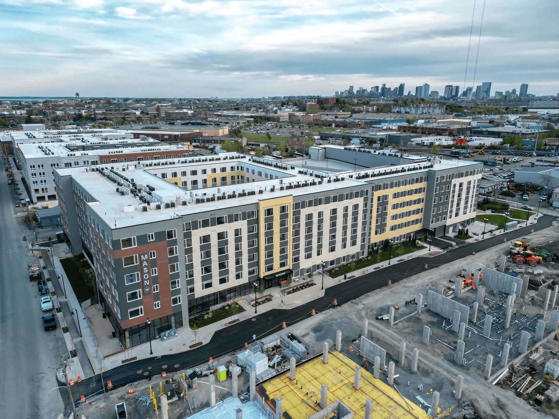 An aerial view of an apartment building under construction.