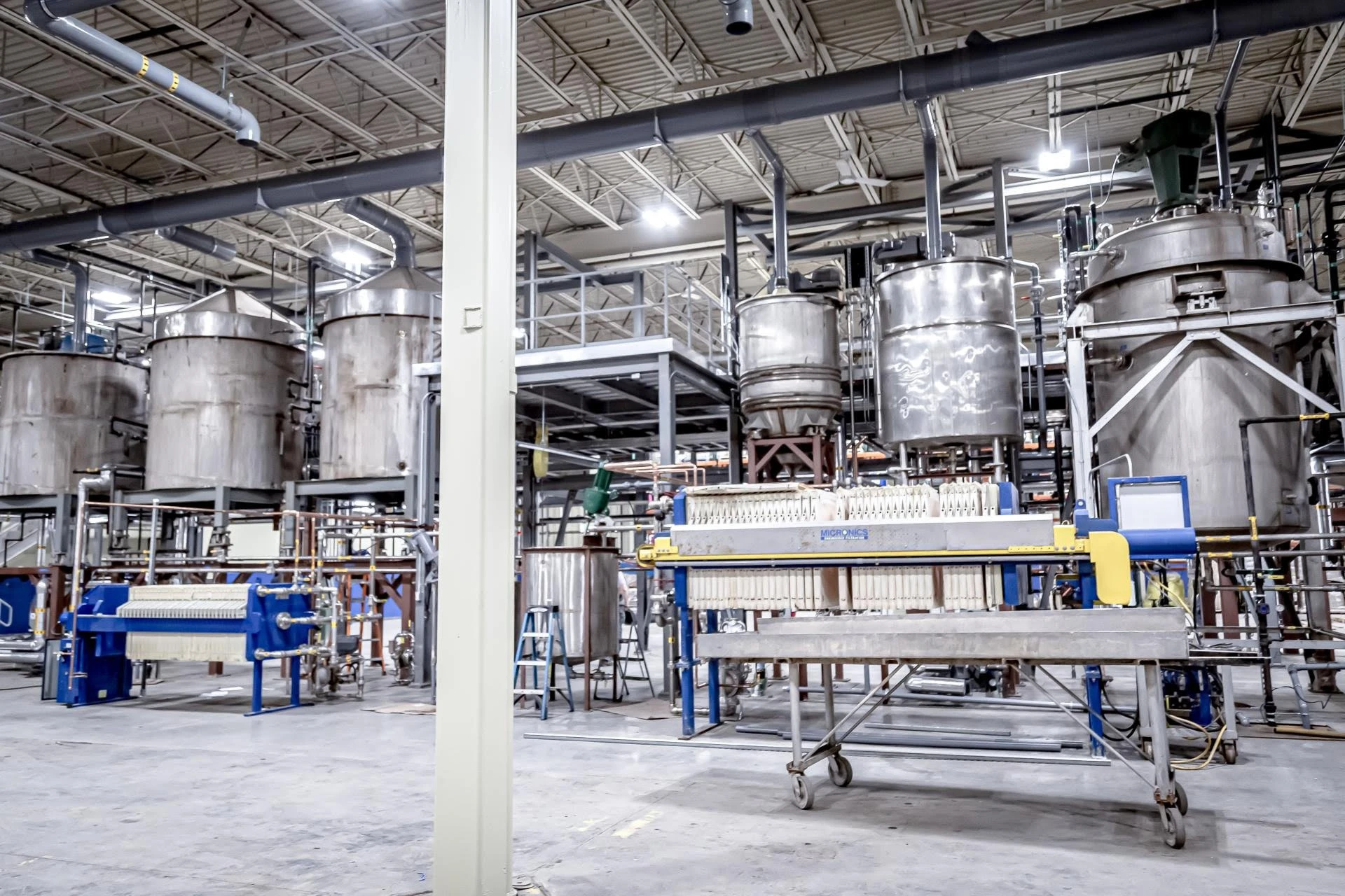 A large factory with many tanks and equipment.