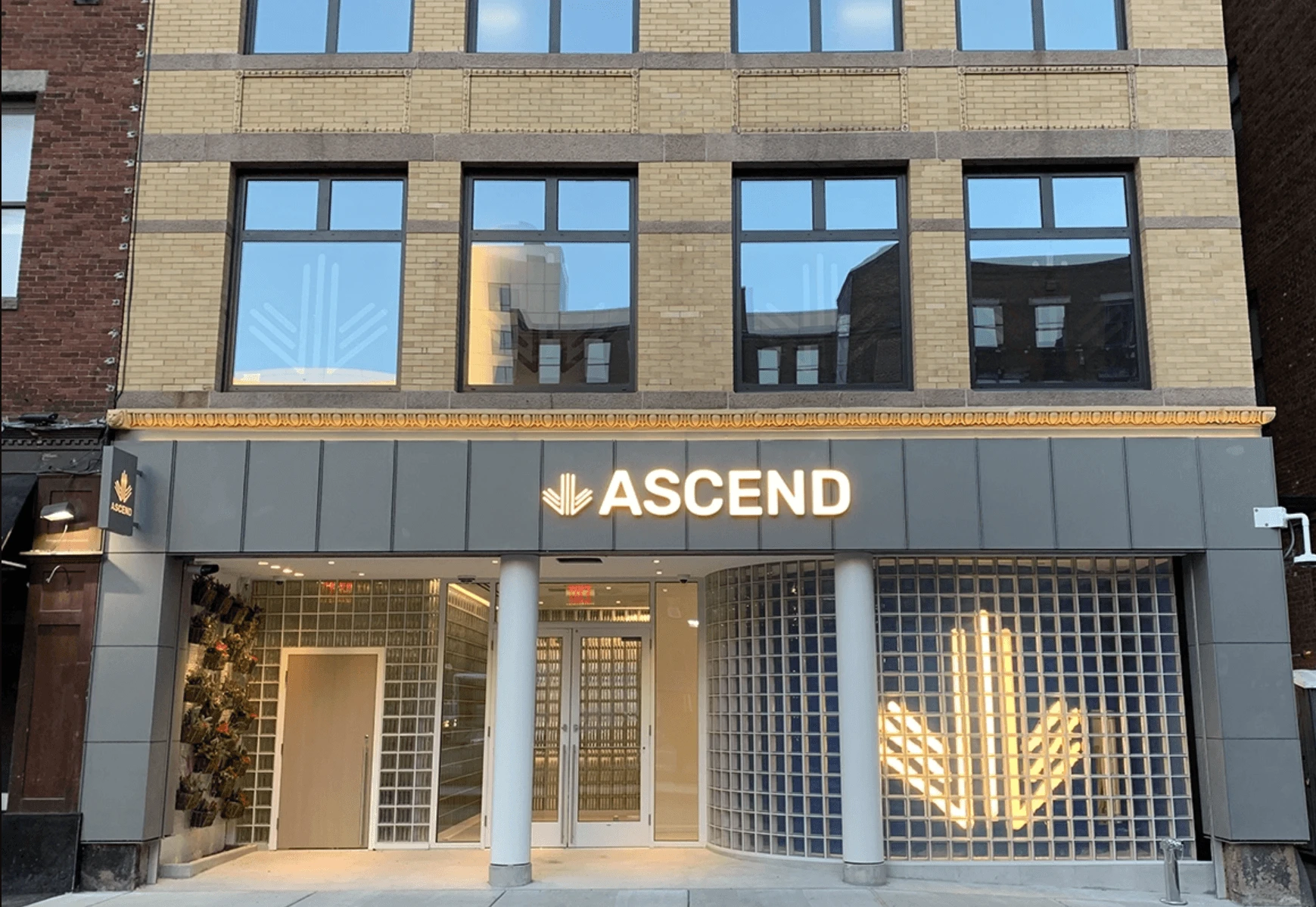 A building with a sign that says ascend.