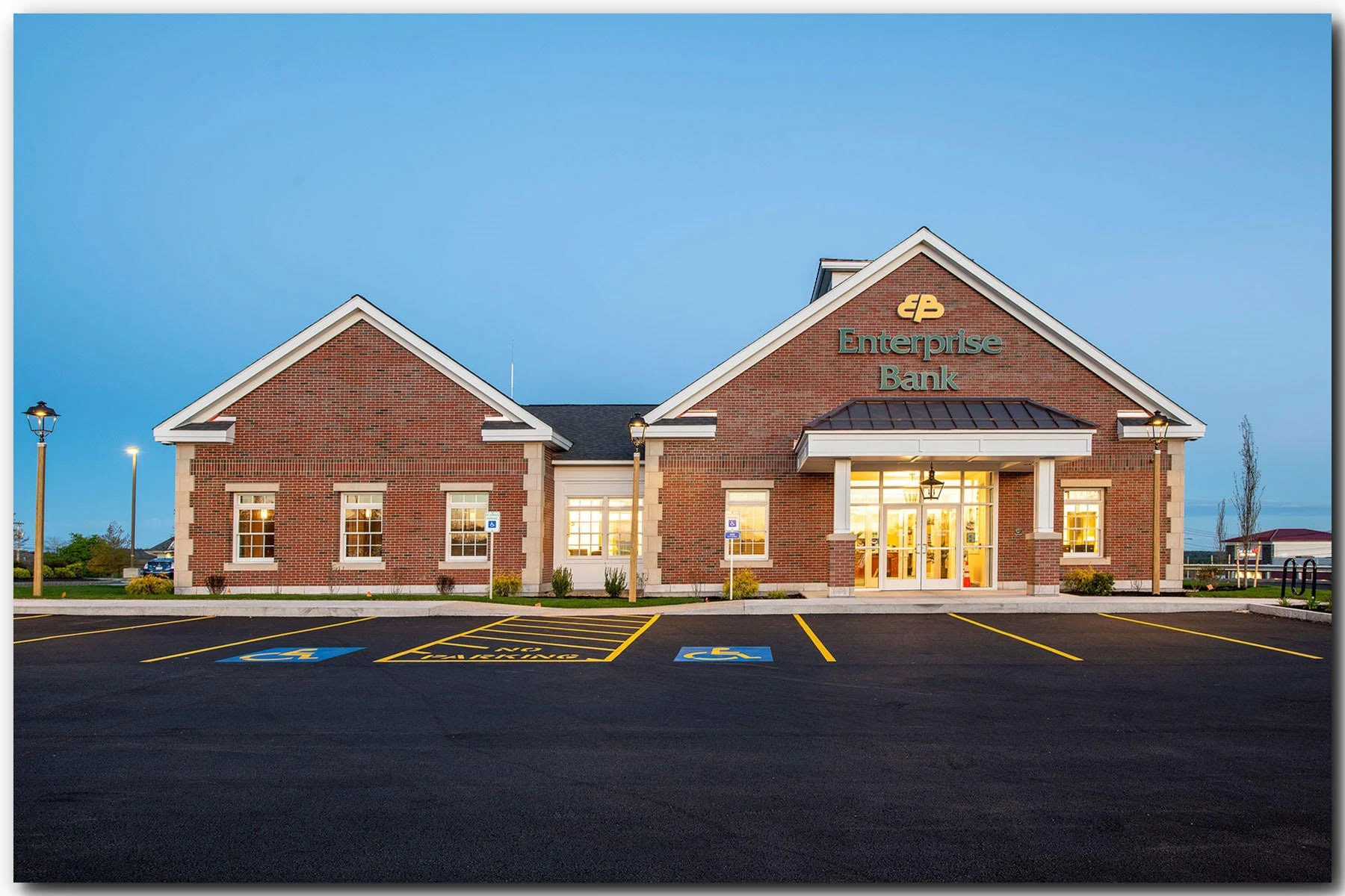 A red brick building at dusk.