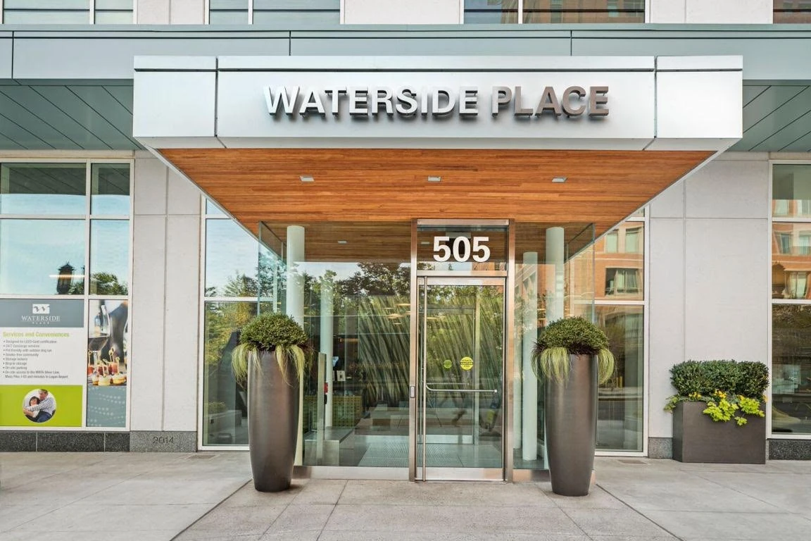 The entrance to a building that says waterside place.